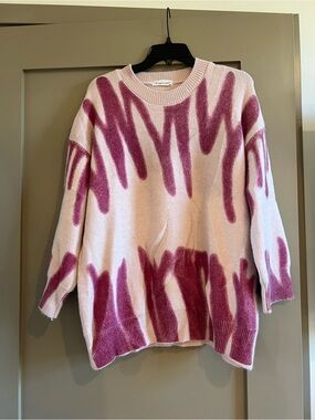 Light Pink Crewneck Sweater with Raspberry Brushstroke Design